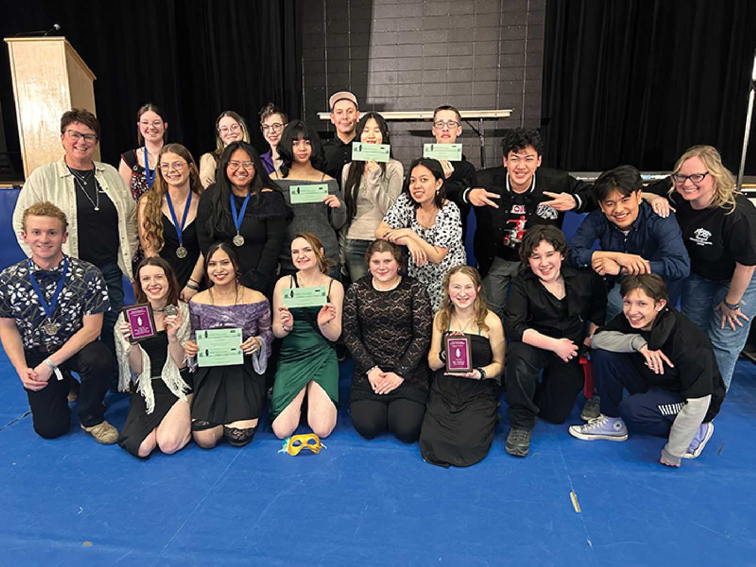 The cast and crew of The Pitch with their awards from the Region 5 Drama Festival.